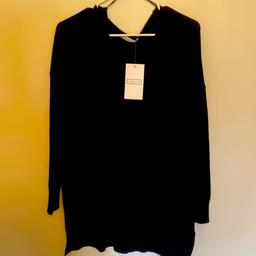 Never worn sweater from wild rose boutique. Small/medium